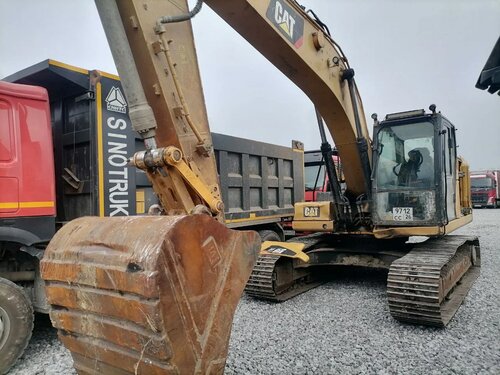 Caterpillar 323 Экскаватор