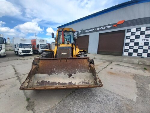 MST M544 Экскаватор-погрузчик